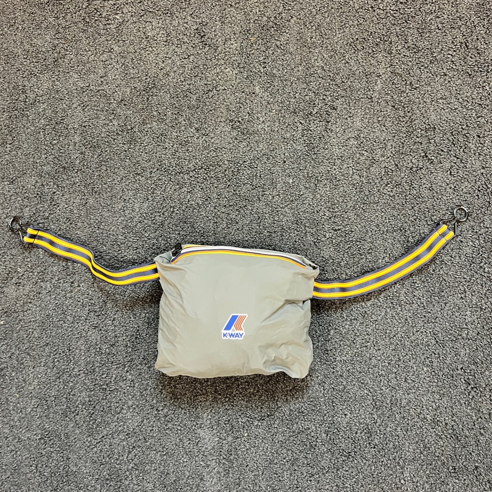 K-Way Gray Windbreaker with Yellow and Blue Accents